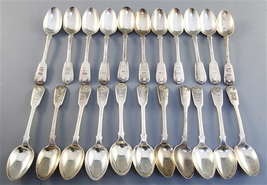 A harlequin set of twenty two William IV silver fiddle and shell pattern teaspoons, engraved with the Houghton crest, 21oz